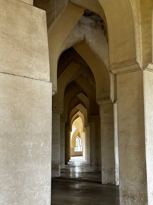 Free Intricate arches inside a mosque in Gulbarga, India showcasing Islamic architecture. Stock Photo