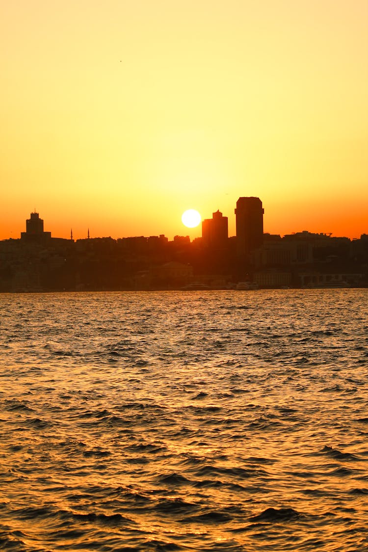 Silhouette Of A City At Dawn 