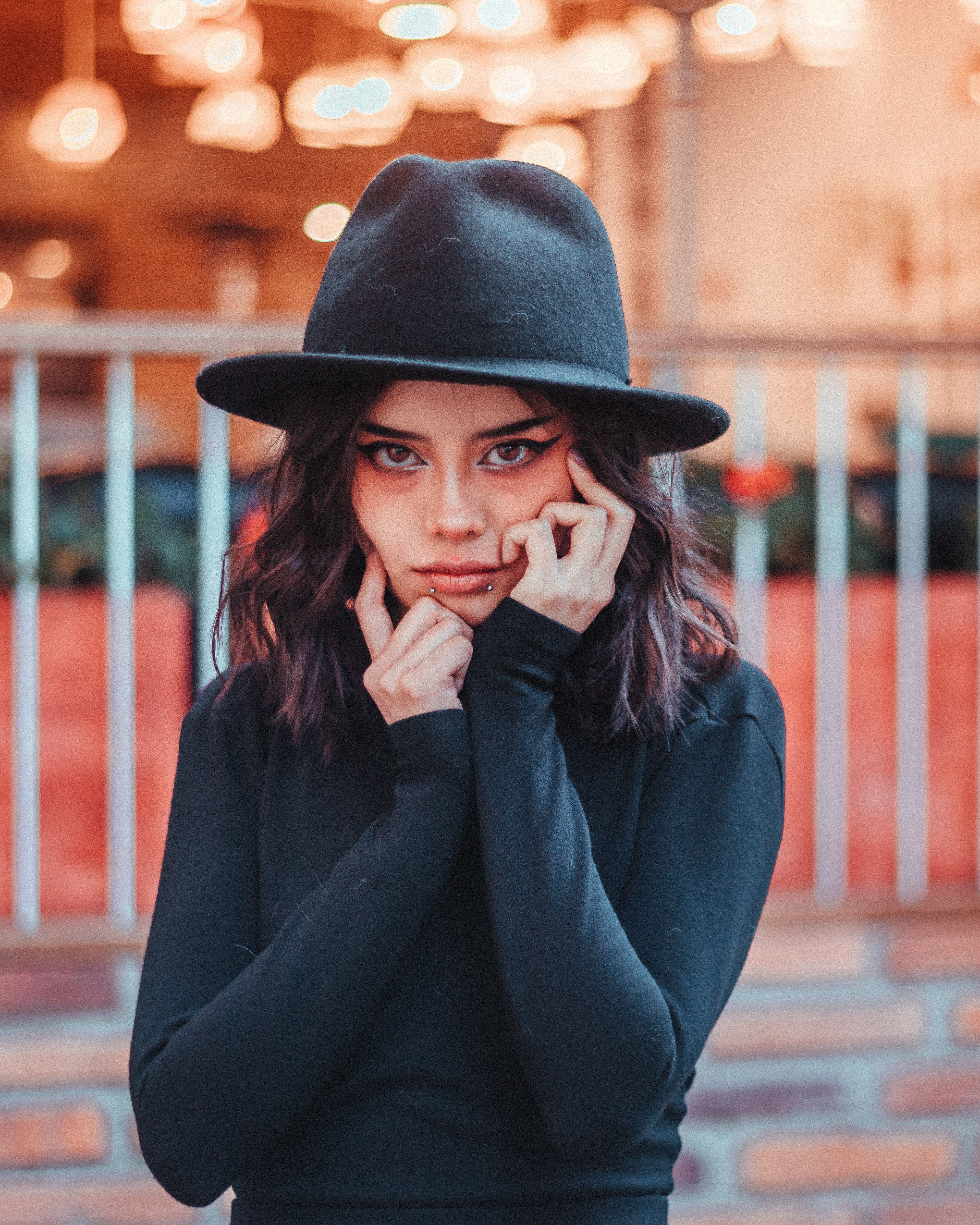 Young Woman in a Black Hat · Free Stock Photo