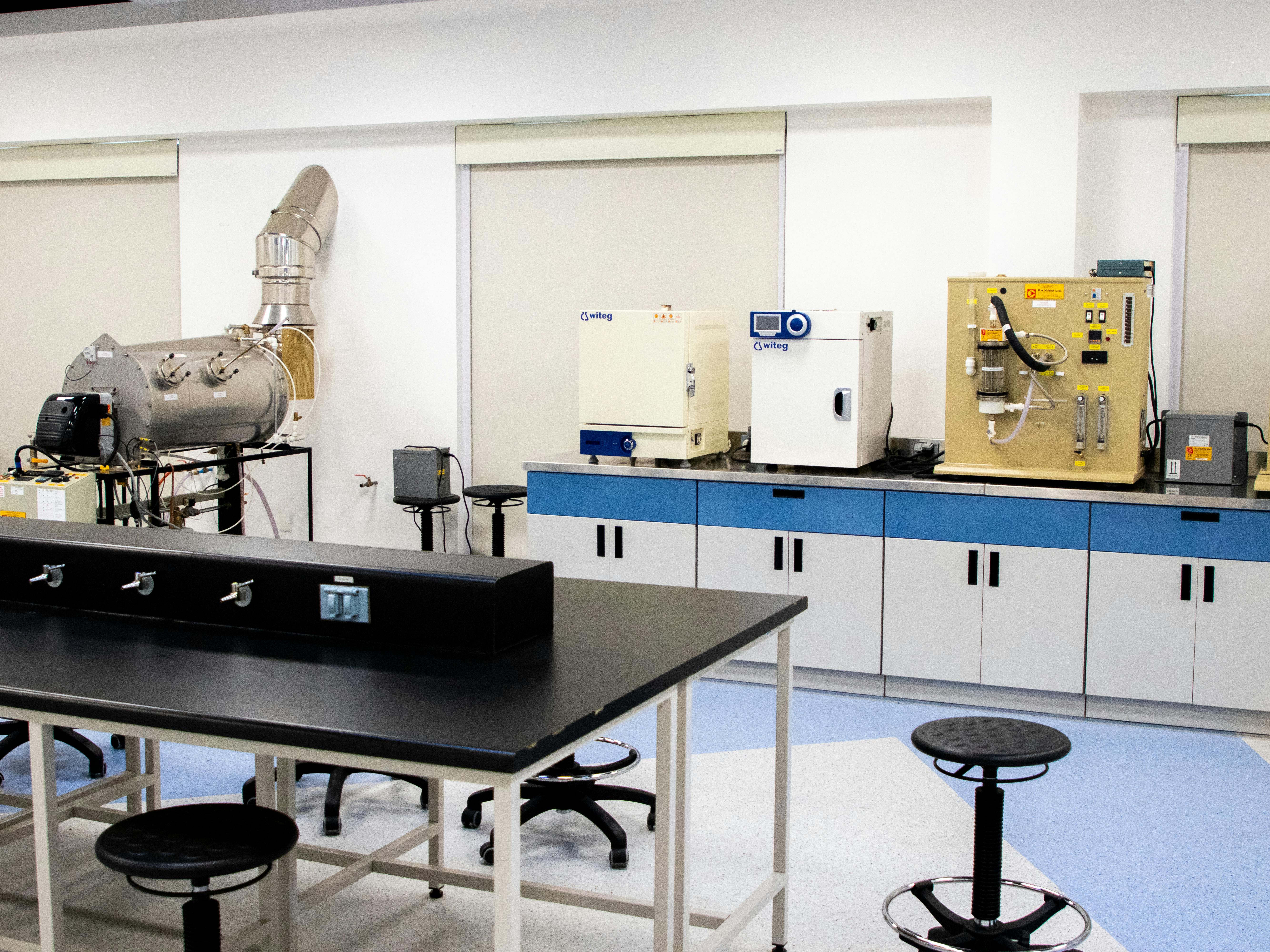 Interior view of a high-tech laboratory with cutting-edge equipment and furniture.