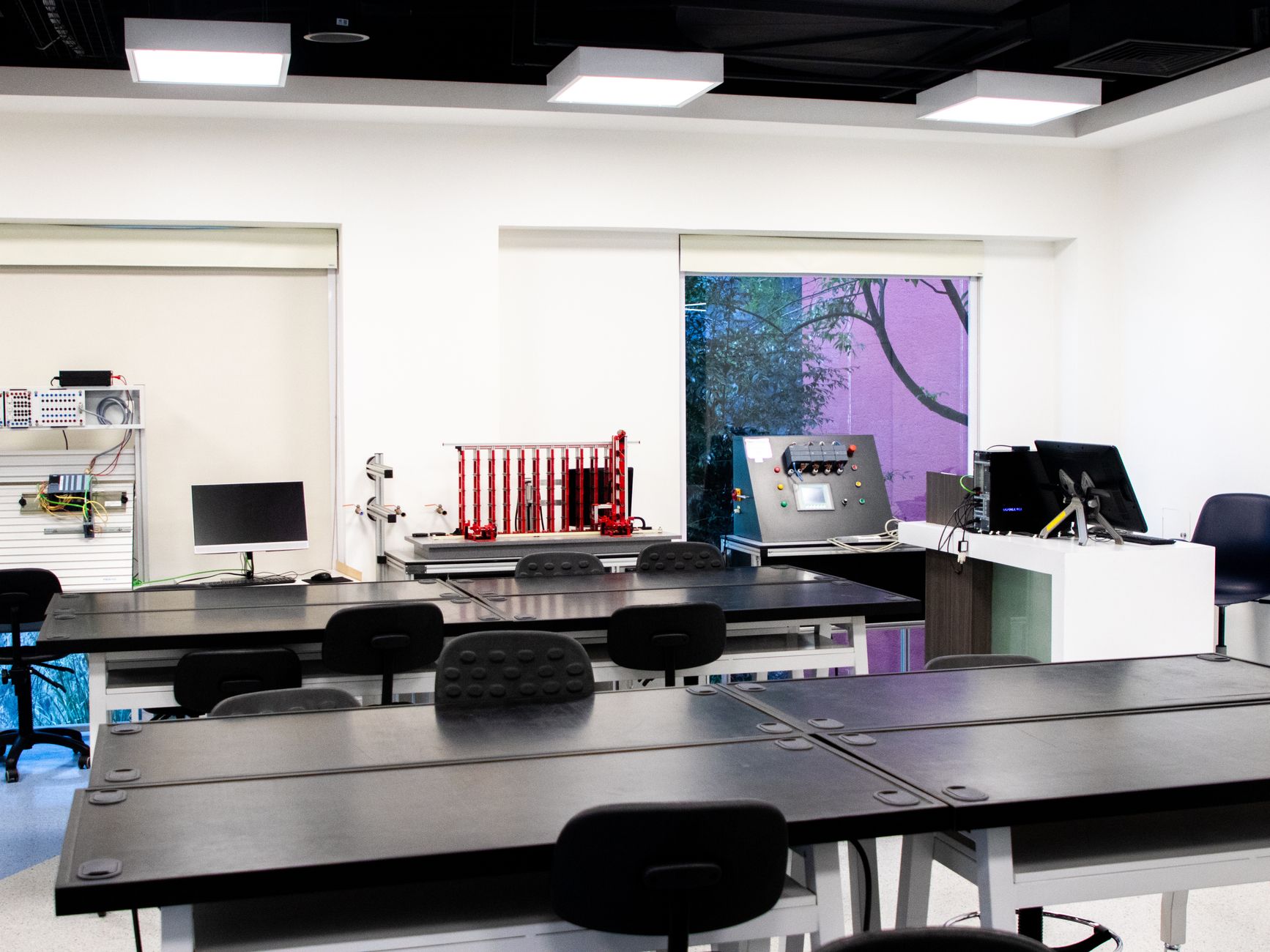 Contemporary lab interior with desks and equipment, perfect for educational purposes.