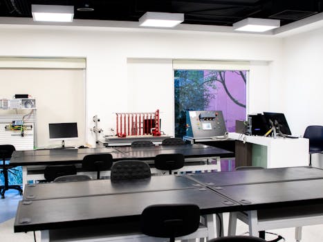 Contemporary lab interior with desks and equipment, perfect for educational purposes.
