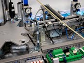 A machine with wires and electronics on it