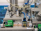 A machine with wires and electronics on it