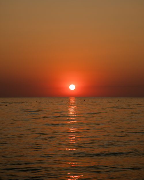 Free Beautiful sunset view over the sea in Ladispoli, Lazio, capturing the serene twilight ambiance. Stock Photo