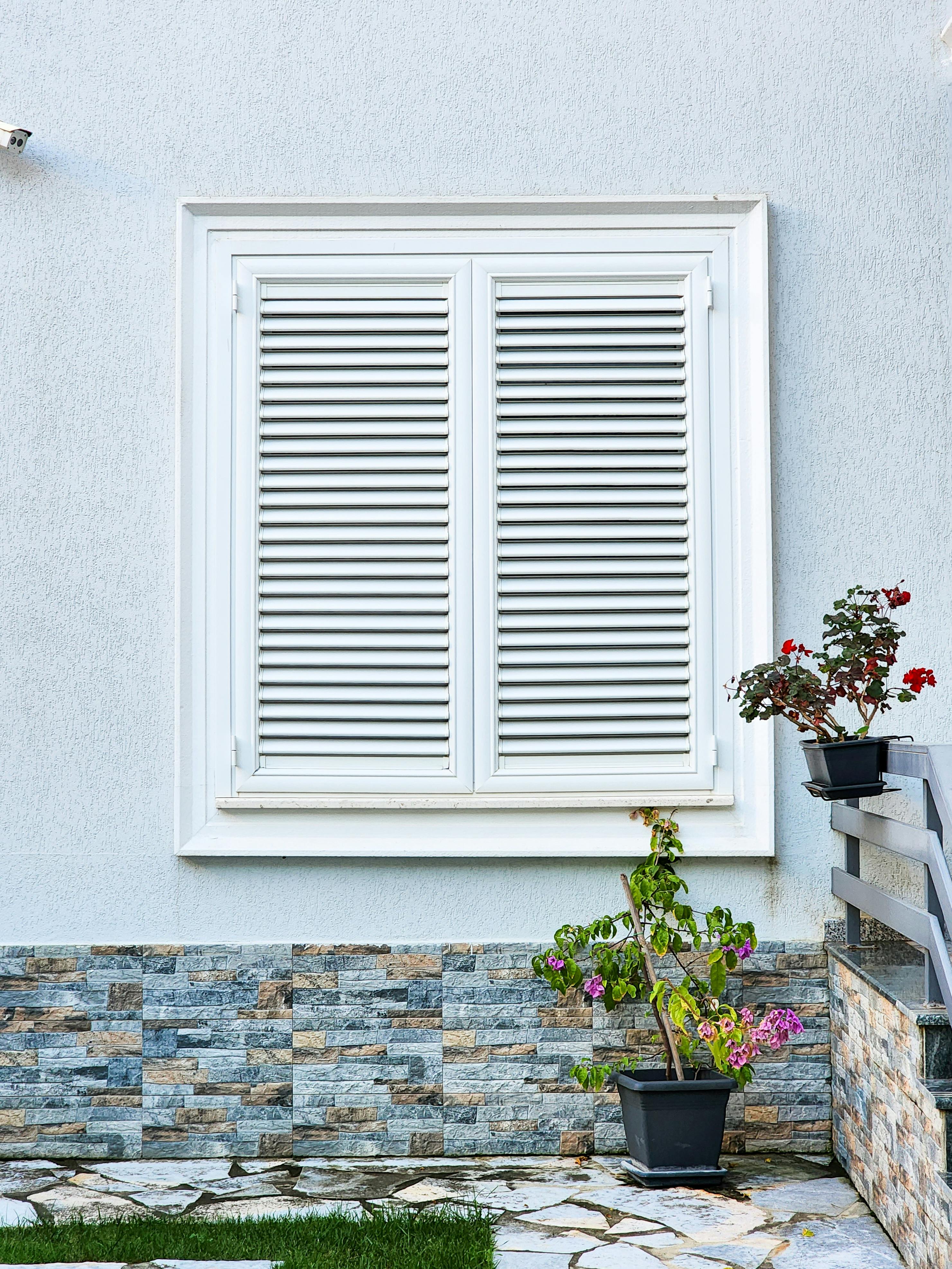House Window with Closed Shutters
