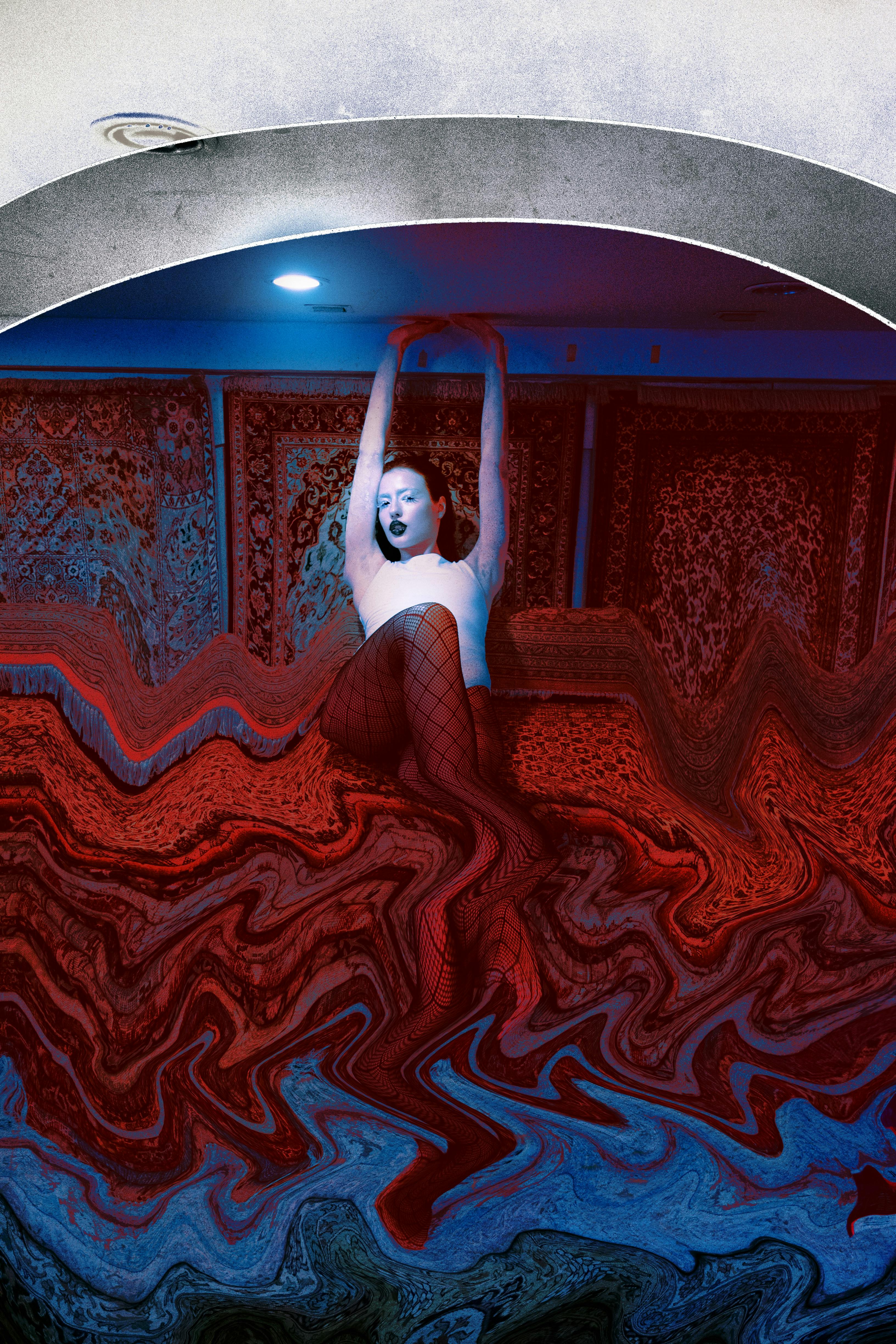 Surreal image of a woman posing against an abstract red and blue background.