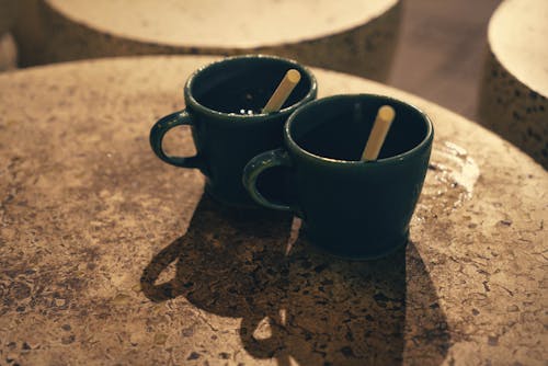 Free Two Cups with Straws on the Table Stock Photo