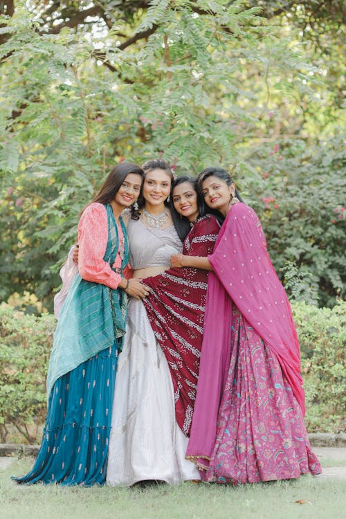 Smiling Women in Traditional Clothing