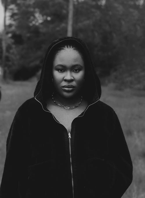 Woman in Hoodie in Black and White