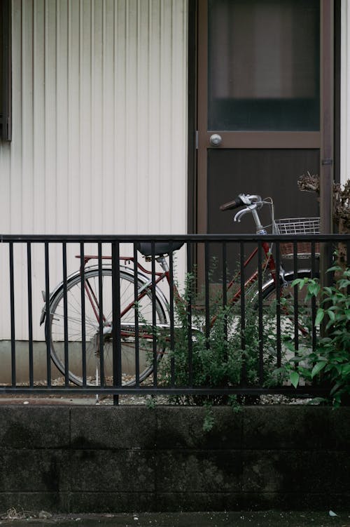 Bicycle behind Railing