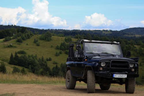 An Off Road Car on the Road in the Countryside