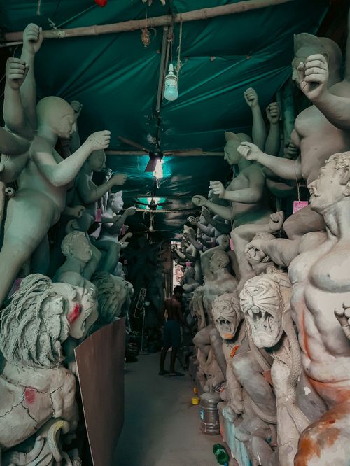 Free A collection of clay sculptures in a Kolkata warehouse, showcasing detailed craftsmanship. Stock Photo