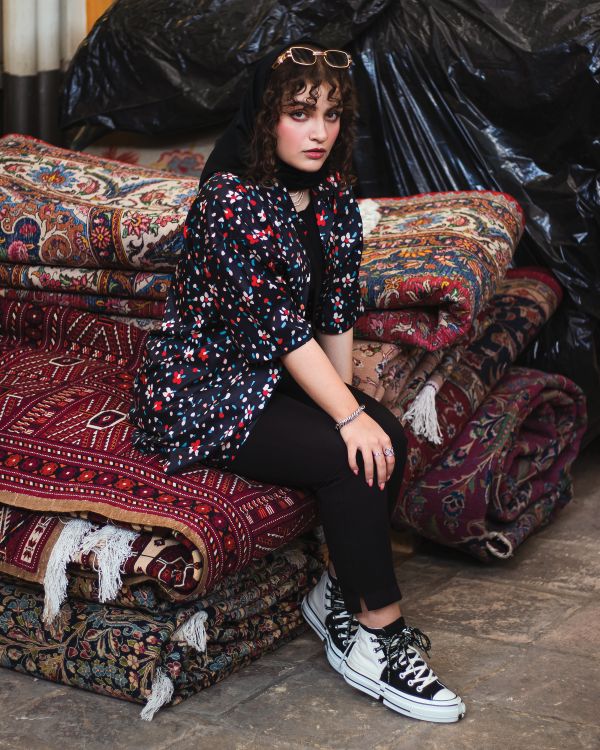 Lady On Rug Woman Sitting on Carpets and Posing · Free Stock Photo