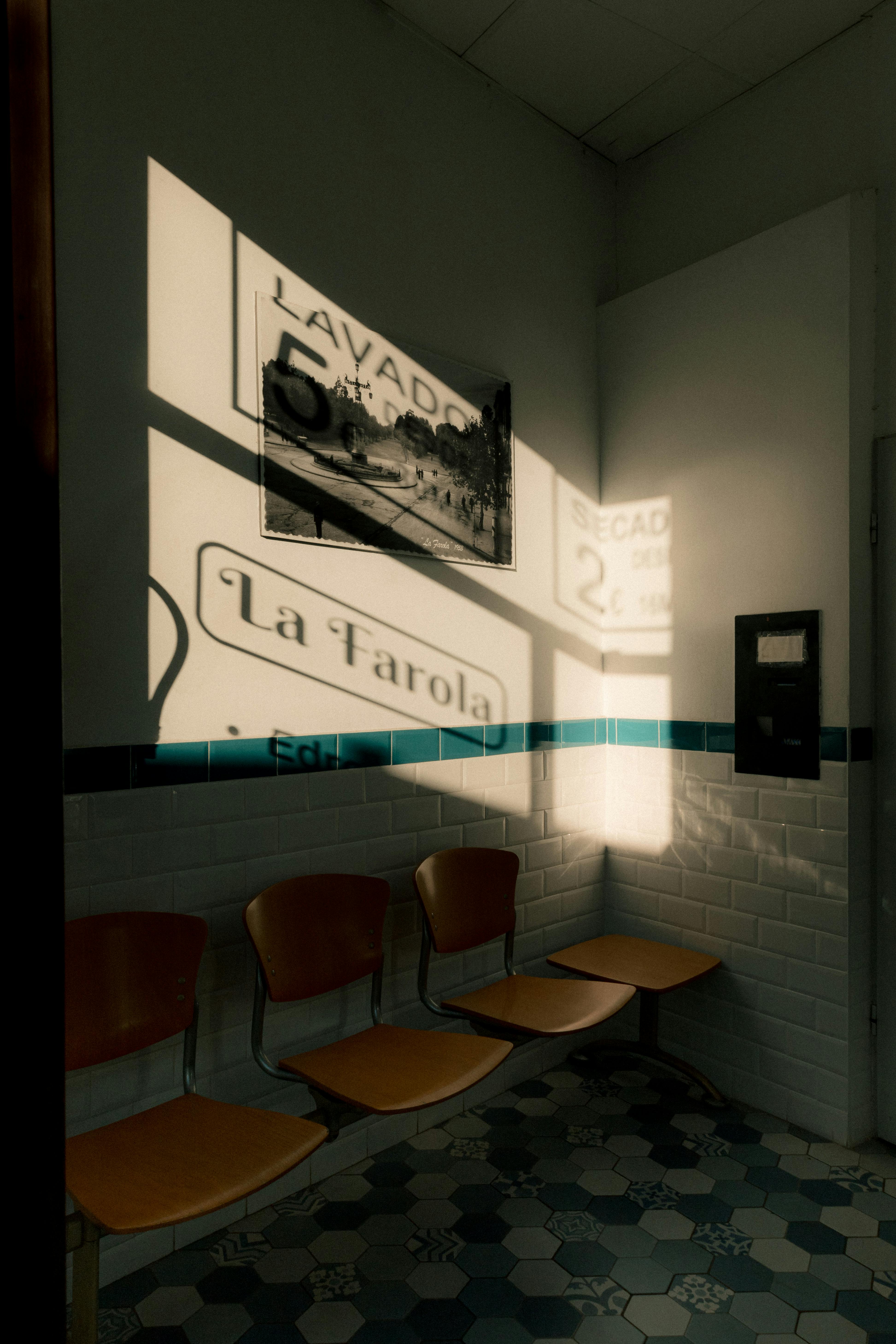Vintage shadows cast on a wall in Valencia, capturing a serene indoor scene.