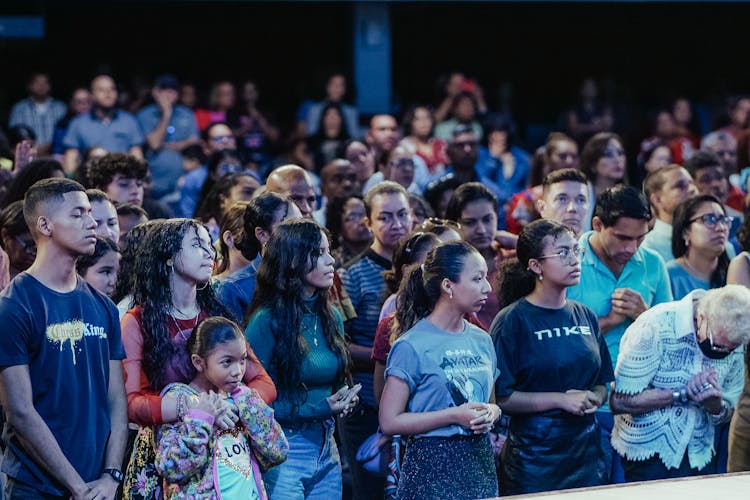 Crowd Standing Together On Event