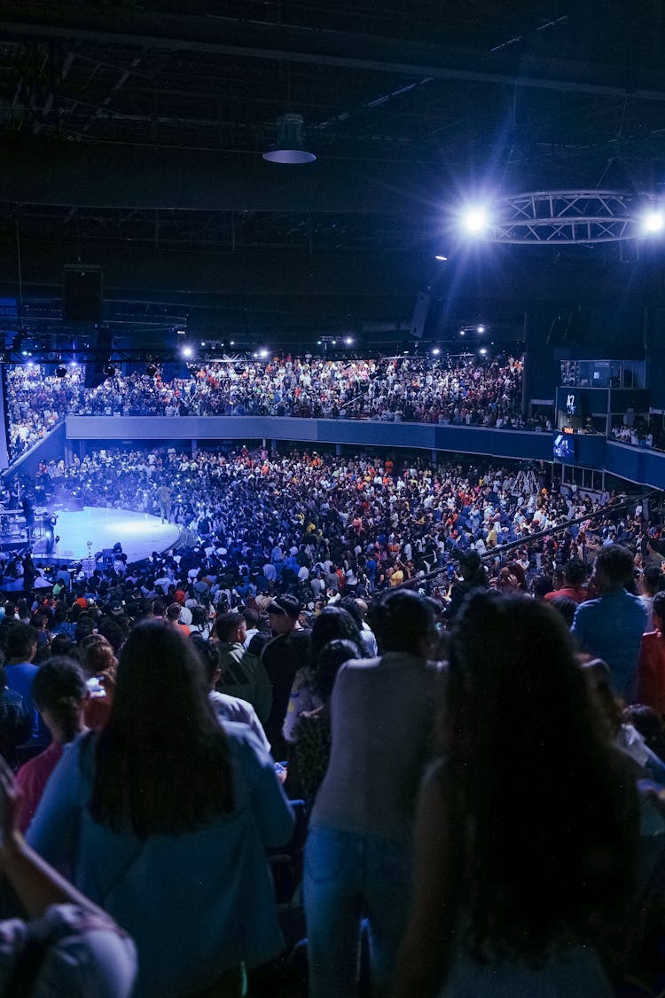 People At A Concert On A Stadium 