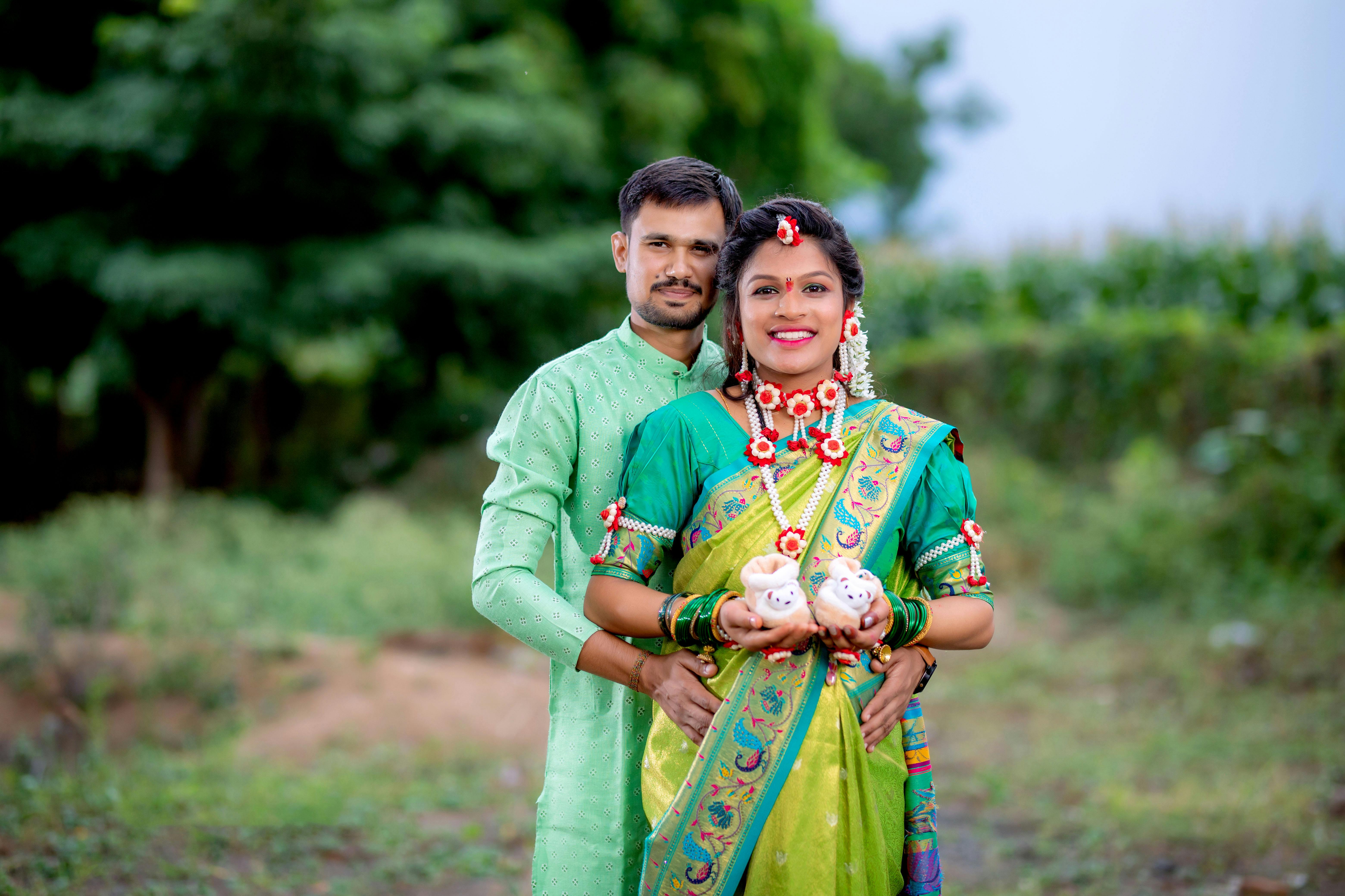 sagarstudio.in maternity photoshoot 2023 maternity photoshoot traditional  pregnancy photoshoot in saree with husband · Free Stock Photo