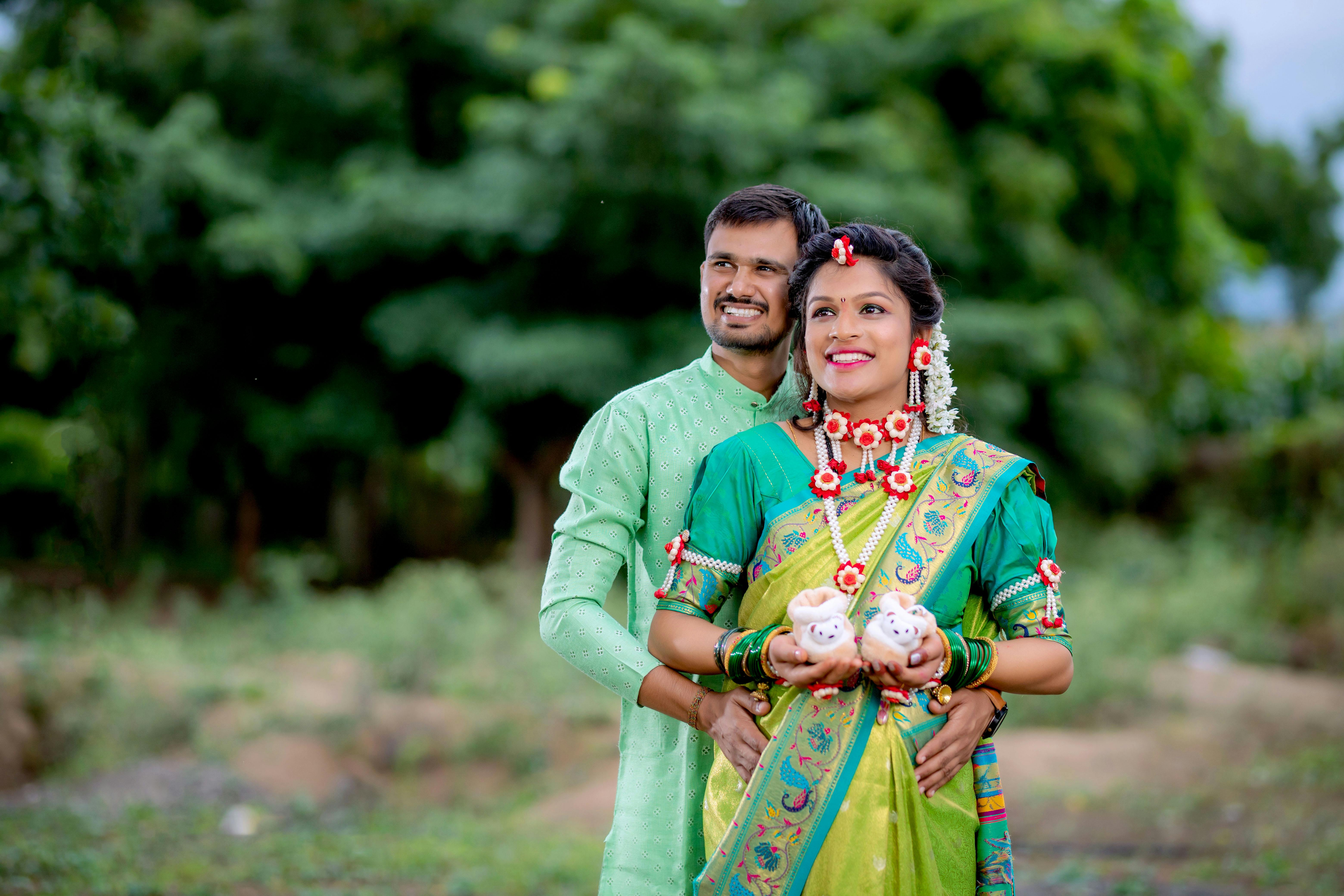 sagarstudio.in maternity photoshoot 2023 maternity photoshoot traditional pregnancy  photoshoot in saree with husband · Free Stock Photo