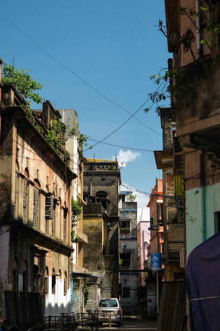 Narrow City Street With Old Residential Buildings