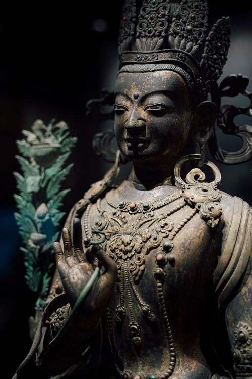 Free Intricate bronze statue representing Eastern religious art with historical significance. Stock Photo