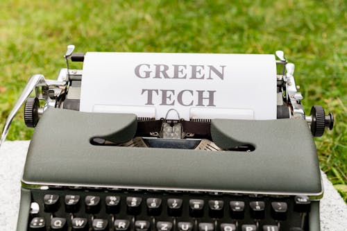 A typewriter with the words green tech on it