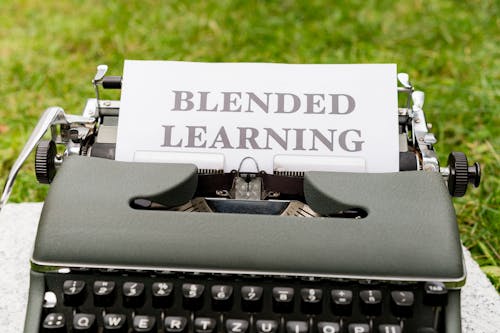 A typewriter with the word blended learning on it