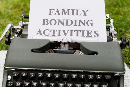 A typewriter with the words family bonding activities on it