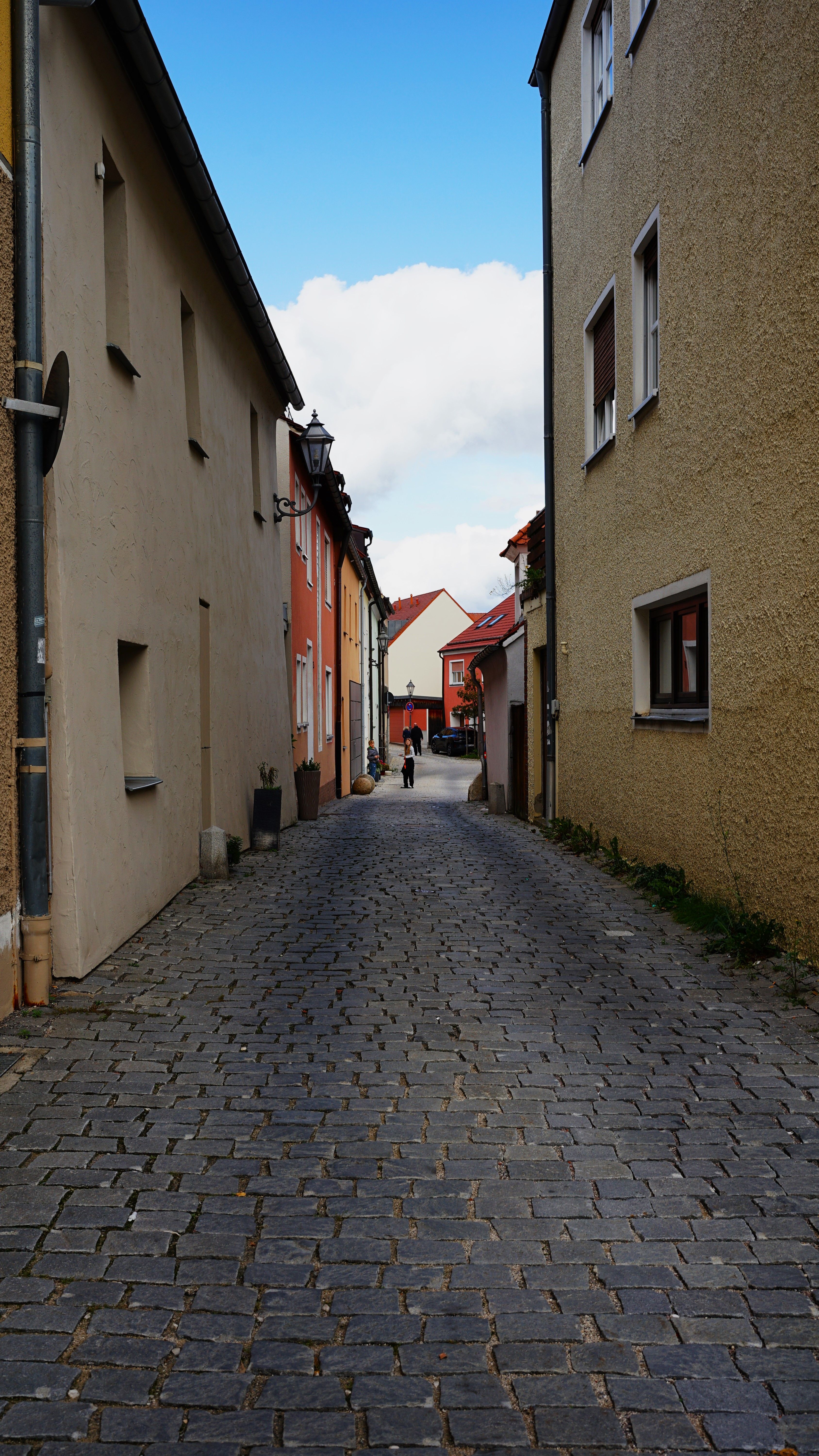Cobblestone Alley between the Buildings in City · Free Stock Photo
