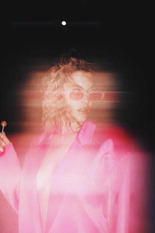 Blurred Woman in Pink Jacket