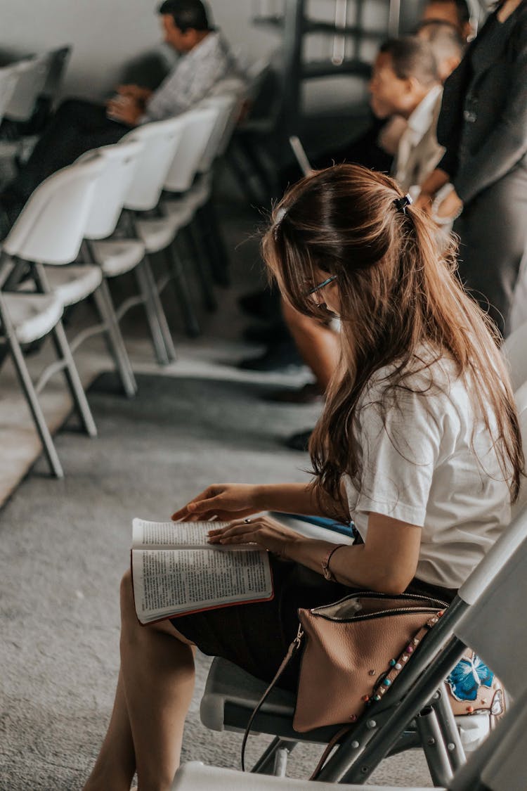 Woman Holding Book