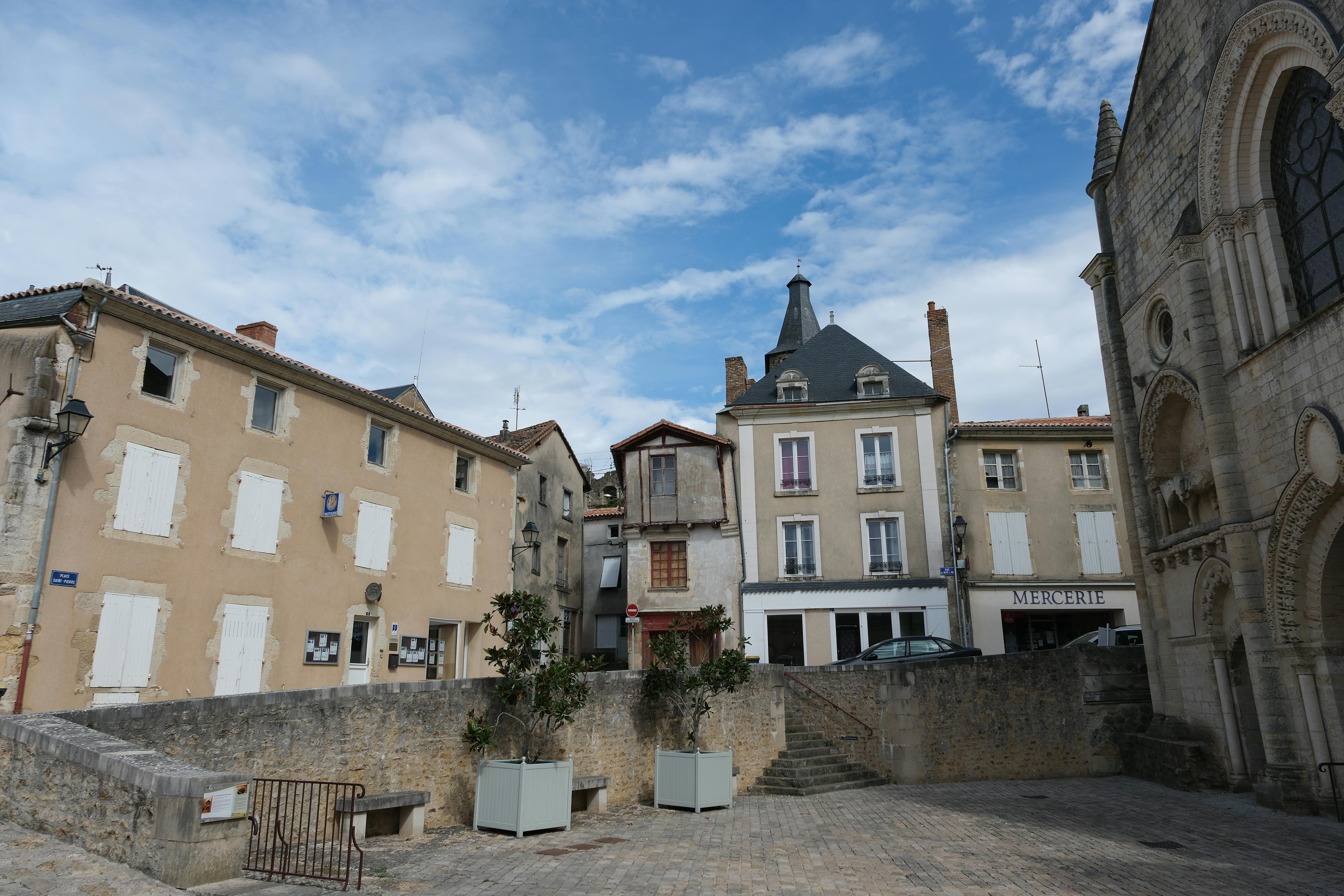 Houses and a Cathedral in Airvault, France · Free Stock Photo