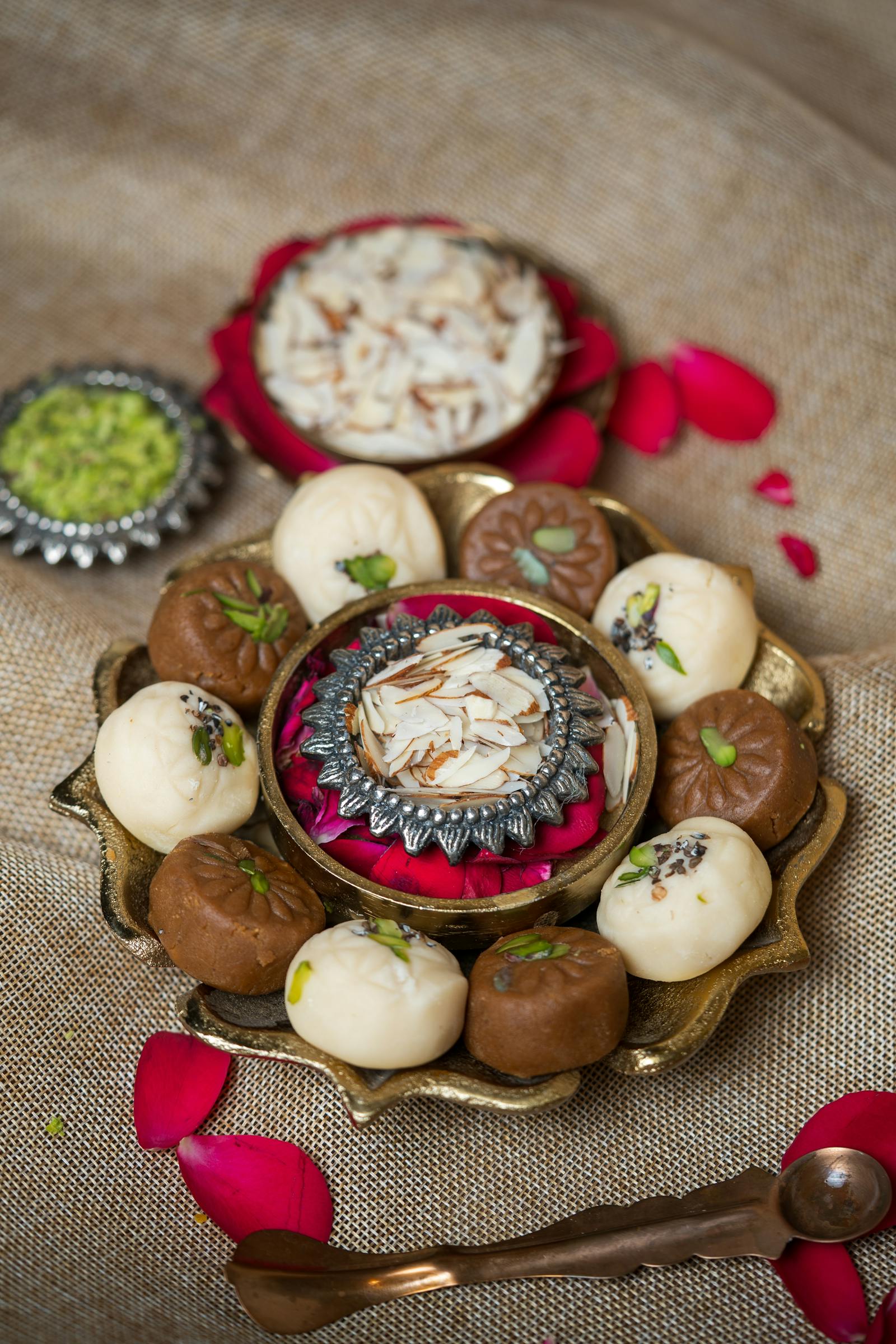 Premium assorted Indian sweets on a brass thali