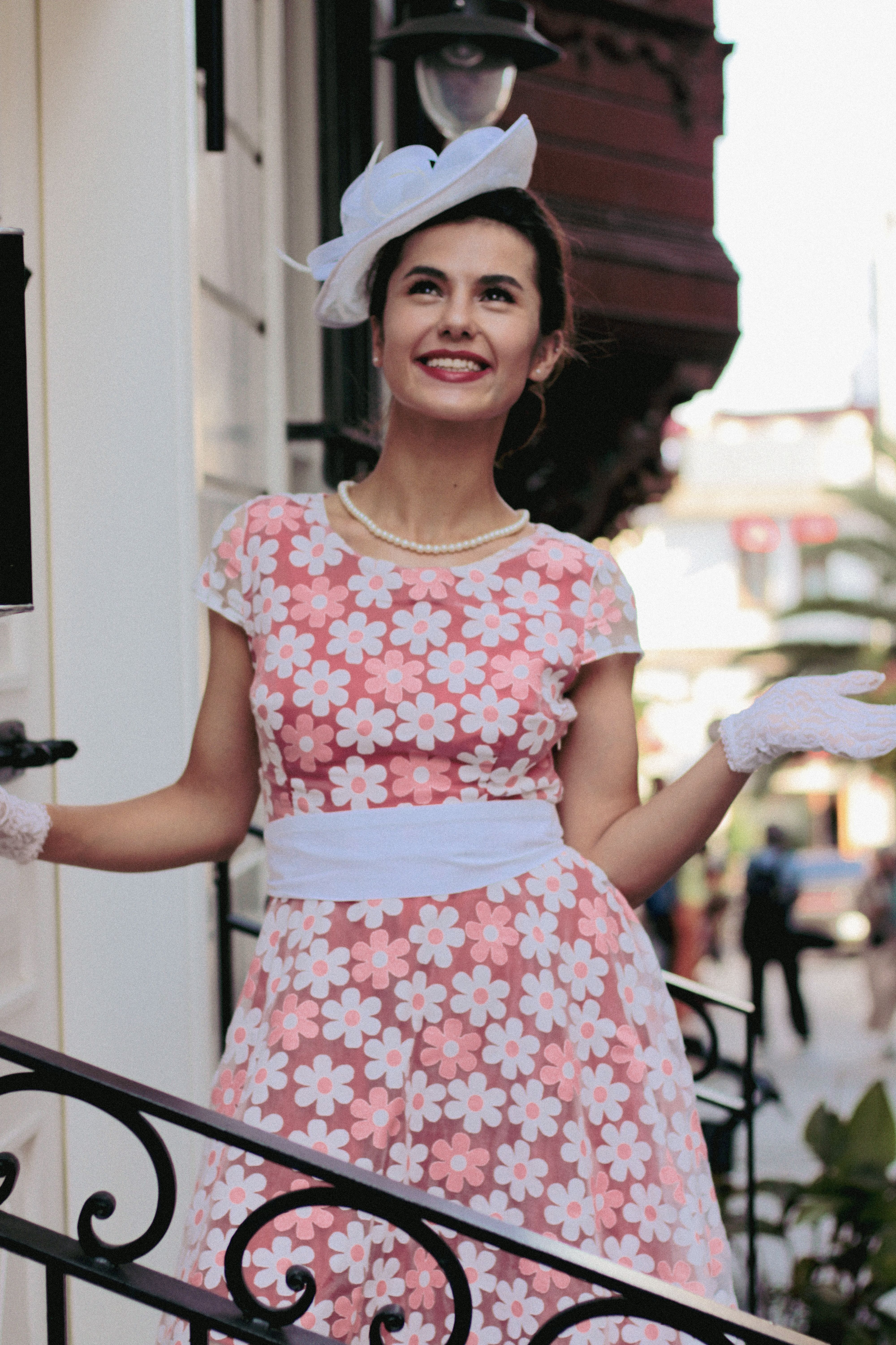 Happy Brunette Woman in Pink Dress and White Hat · Free Stock Photo