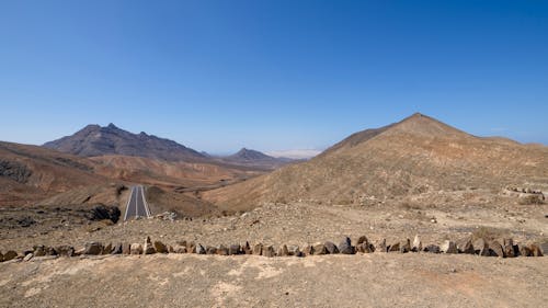 Panoramic View of Mountains under Blue Sky