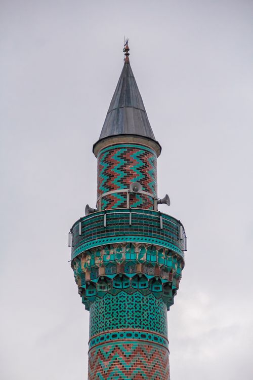 Free Close-up of a vibrant Ottoman minaret with geometric patterns, showcasing Islamic architecture. Stock Photo