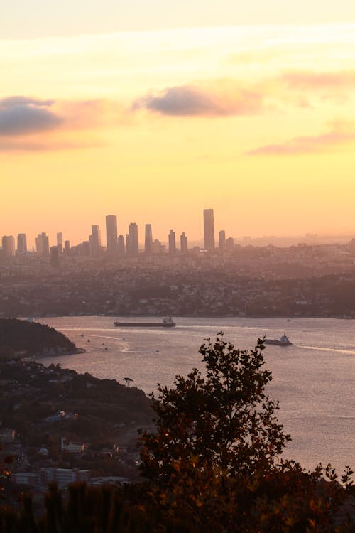 Transport Ships on the Bosphorus Strait and Istanbul at Sunset