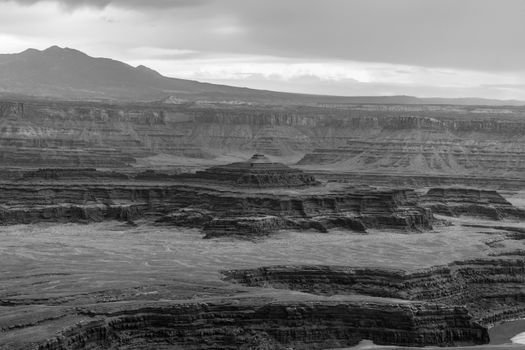 Dramatic view of eroded canyons in black and white, captured in Moab, Utah, USA.