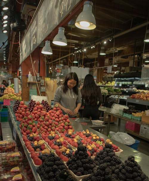 Women at Bazaar with Fruit