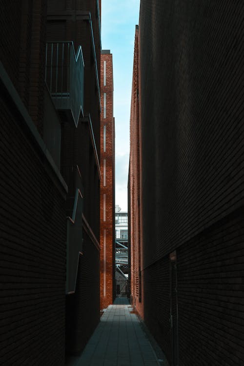 Foto d'estoc gratuïta de arquitectura, carreró, edificis