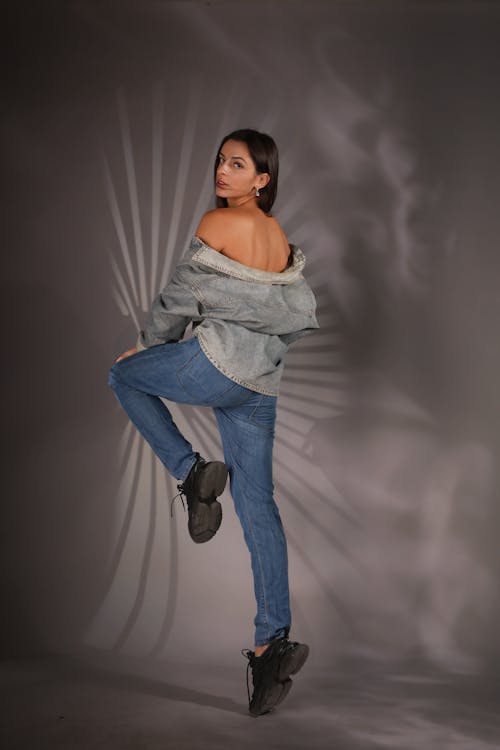 Model Posing in Gray Shirt