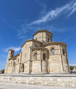 Historic Romanesque church in Frómista, Spain under a blue sky.