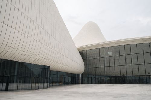 Free Sleek contemporary design of the Heydar Aliyev Center in Baku, Azerbaijan. Stock Photo