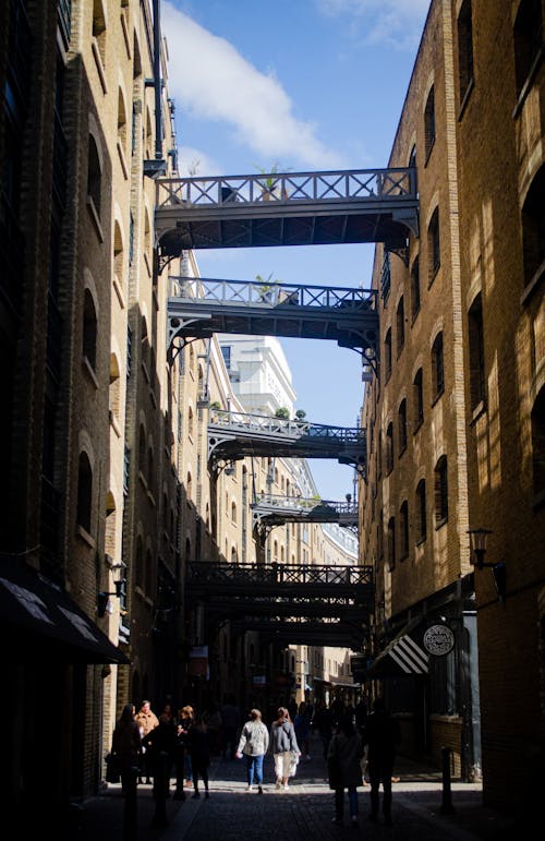 People in Narrow Alley in London