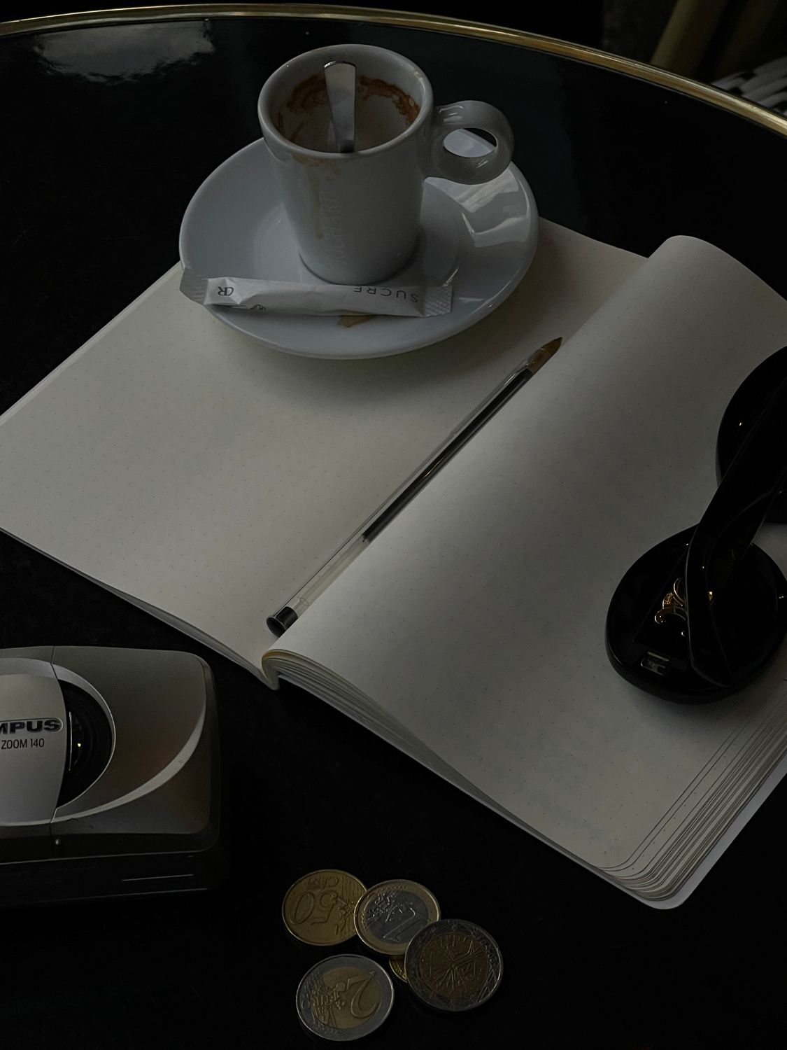 Notepad Cafe Coffee Cup and Notepad on Cafe Table · Free Stock Photo