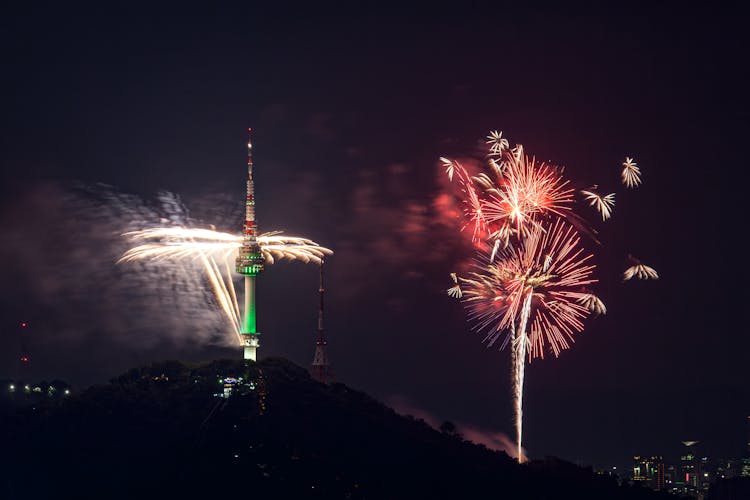 Seoul Tower Against Fireworks Display At Night