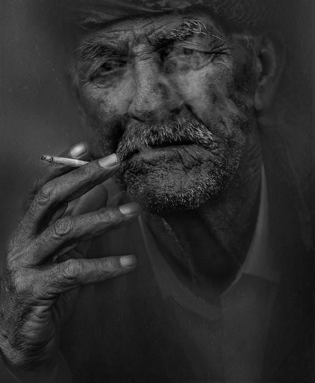 Free Man Smoking Cigarette Stock Photo