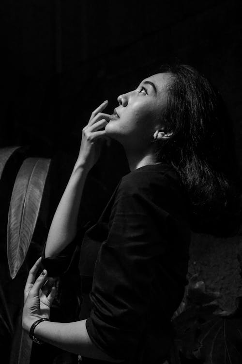 Woman Looking Up in Black and White