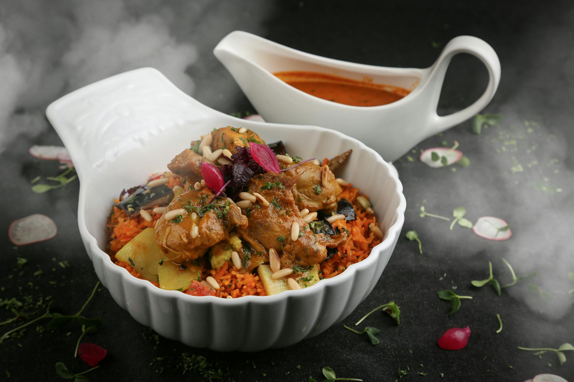 A savory traditional Moroccan tagine served with sauce, capturing ethnic cuisine's rich flavors.