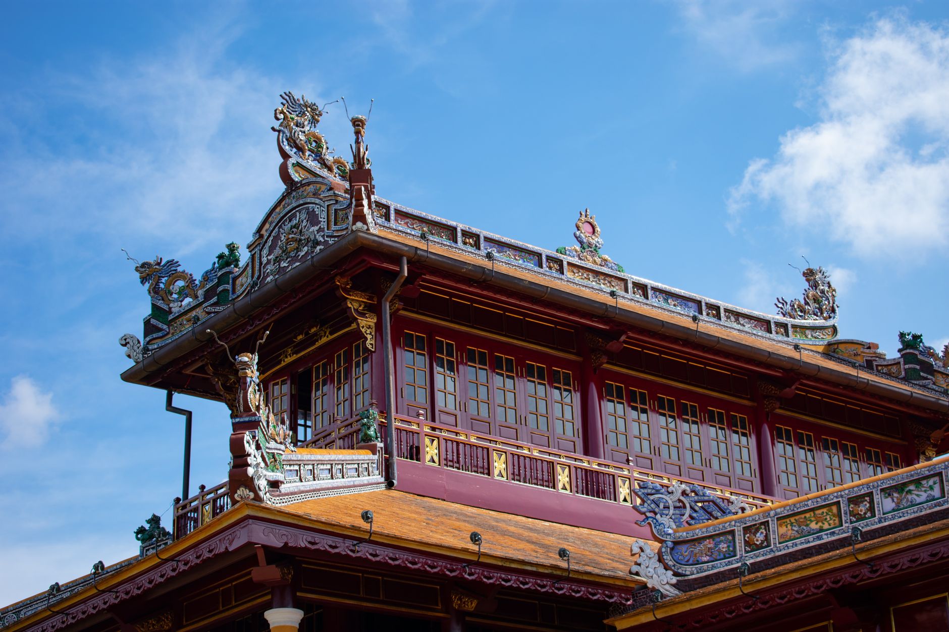 Intricate traditional Vietnamese roof at the Imperial City in Hue, Vietnam.
